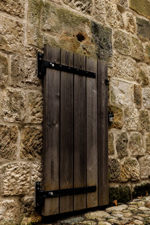 Vintage wooden door in the castle. Medieval building. Knights Castleの写真素材