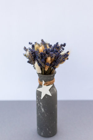 Bouquet of lavender and cotton on a table in a vase. Bouquet of dried flowers. High quality photoの写真素材