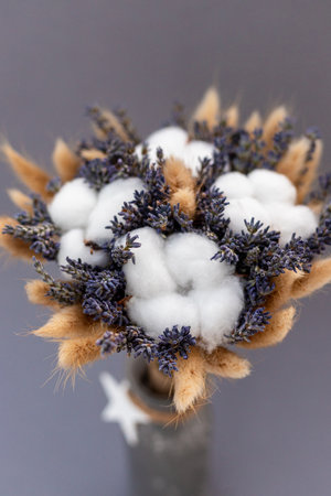 Bouquet of lavender and cotton on a table in a vase. Bouquet of dried flowers. High quality photoの写真素材
