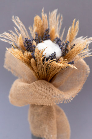 Bouquet of lavender and cotton wrapped in burlap. Handmade. High quality photoの写真素材