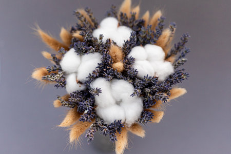 Bouquet of lavender and cotton on a table in a vase. Bouquet of dried flowers. High quality photoの写真素材