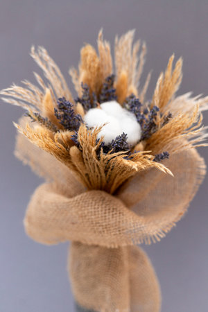 Bouquet of lavender and cotton wrapped in burlap. Handmade. High quality photoの写真素材
