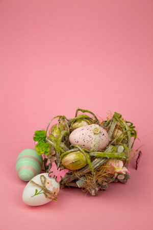 Easter composition on a pink background. Easter eggs on a pink background. High quality photoの写真素材