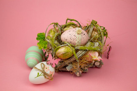 Easter composition on a pink background. Easter eggs on a pink background. High quality photoの写真素材