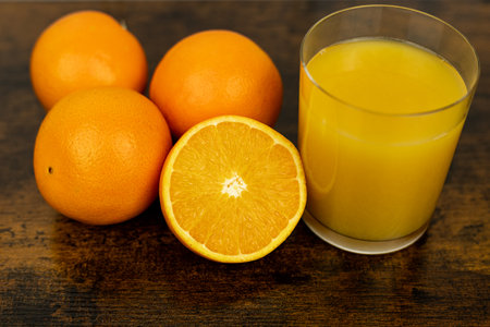 Healthy orange juice. A glass of juice on the table. Orange diet High quality photoの写真素材