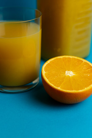 Close-up of freshly cut orange and glass of freshly squeezed juice. High quality photoの写真素材