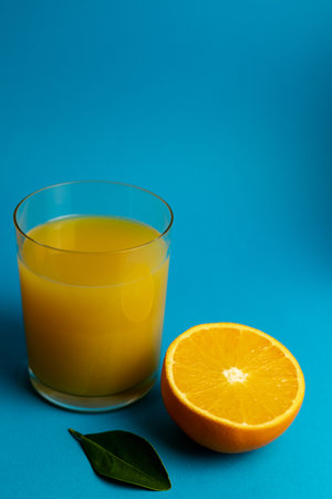 Glass of orange juice in glass close-up. High quality photoの写真素材