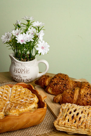 Fresh homemade pastries close-up. Bakery products in the kitchen at home.の写真素材