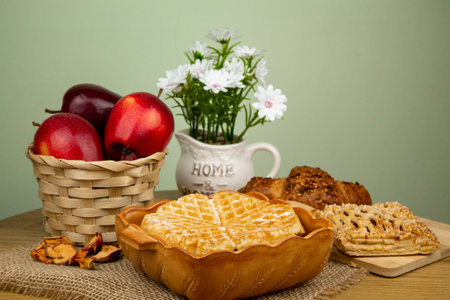 Homemade pastries. Sweet pastries at home. Croissants, waffles on the table.の写真素材