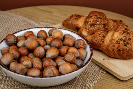 Hazelnuts. Healthy food. Healthy organic nuts in a plate on the table. High quality photoの写真素材