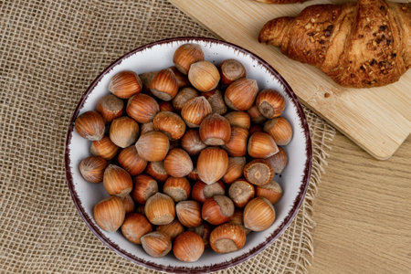 Hazelnuts. Healthy food. Healthy organic nuts in a plate on the table. High quality photoの写真素材