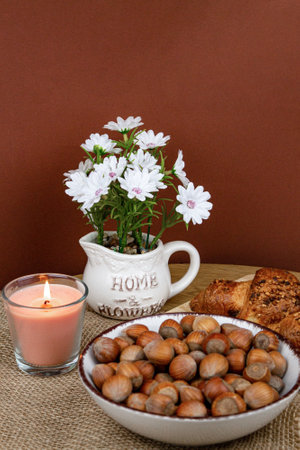 Croissants and hazelnuts on the table. Delicious healthy breakfast. Top view. High quality photoの写真素材