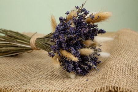 Bouquet of dried lavender. Dried flowers on burlap. Bouquet of dried flowers. High quality photoの写真素材