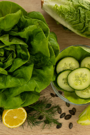 Vegetables from the garden. Ingathering. Making salad at home in the kitchen. High quality photoの写真素材