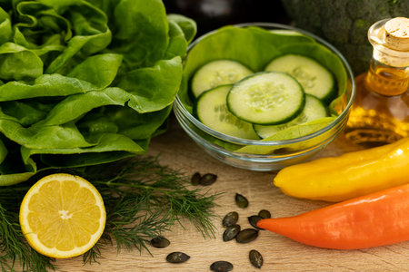 Vegetables from the garden. Ingathering. Making salad at home in the kitchen. High quality photoの写真素材