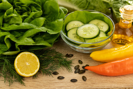 Vegetables from the garden. Ingathering. Making salad at home in the kitchen. High quality photoの写真素材