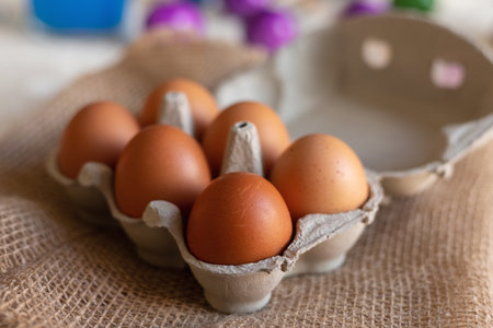 Chicken eggs in an egg carton. Homemade chicken eggs close-up. High quality photoの写真素材