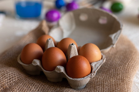 Chicken eggs in an egg carton. Homemade chicken eggs close-up. High quality photoの写真素材