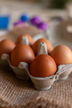 Chicken eggs in an egg carton. Homemade chicken eggs close-up. High quality photoの写真素材