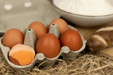 Freshly baked bread, flour, eggs. The process of baking bread. Baking Ingredients. High quality photoの写真素材