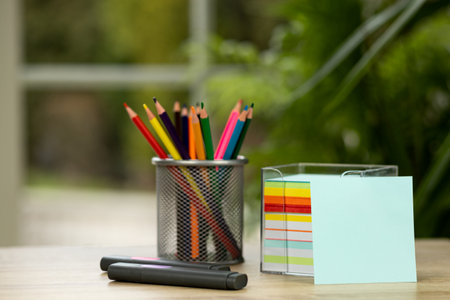 Colored pencils in a stand. Stationery in the office. Schoolchildren's stationery. High quality photoの写真素材