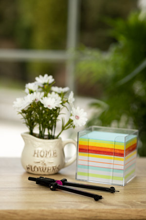 Paper for notes. Home office. Work desk by the window. Student supplies. High quality photoの写真素材