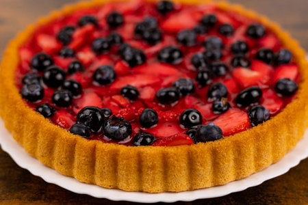 Berry pie close-up. A fresh summer dessert. Homemade cakes. High quality photoの写真素材