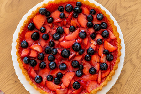Strawberry pie top view. Beautiful fruit cake on the table. Homemade cakes. High quality photoの写真素材