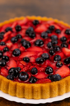 Berry pie close-up. A fresh summer dessert. Homemade cakes. High quality photoの写真素材