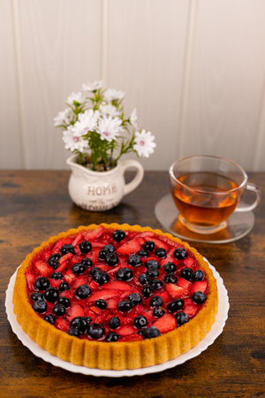 Berry pie and tea on the table. Dessert for tea. Berry pie. High quality photoの写真素材