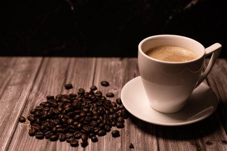 Morning cup of coffee. Fragrant Arabica beans. Coffee on a dark background. High quality photoの写真素材