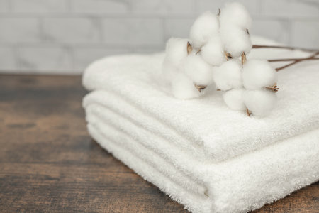 White terry towel. Cotton towel. White basin. Bathroom. High quality photoの写真素材