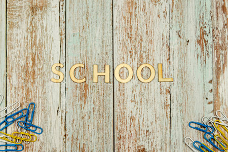 School banner top view. School background with scissors and paper clips. Education at school. High quality photoの写真素材