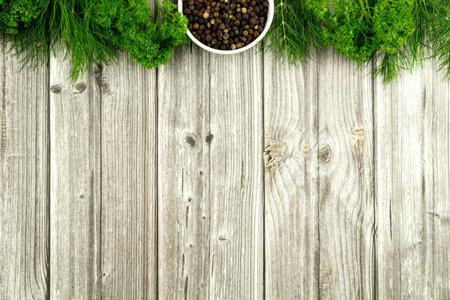 Fragrant fresh herbs for cooking on a wooden table. Background for writing a recipeの写真素材