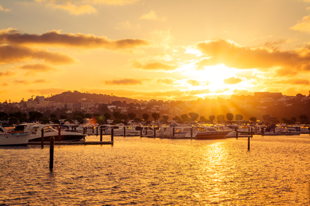 Golden hour over marina in central Auckland, New Zealandの写真素材