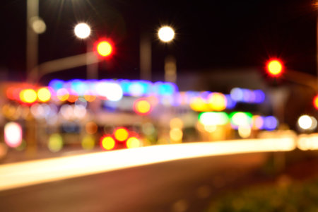 De-focused image of a night city street. Urban backgroundの写真素材