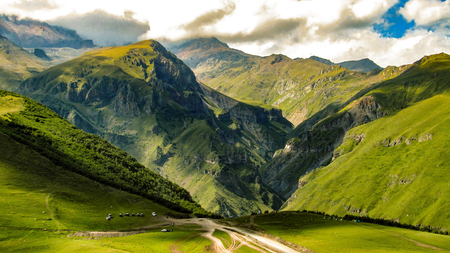Mountain kazbek. Caucasus mountains. Beauty world. Cloudy morning view of the mountain hill in Upper Svanetia, Georgia, Europe.の写真素材