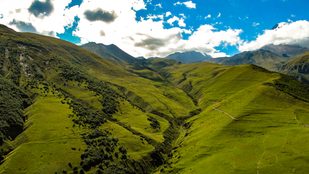 Caucasus mountains. Beauty world. Cloudy morning view of the mountain hill in Upper Svanetia, Georgia, Europe.の写真素材