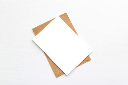 Hello winter. Blank white postcard postcard flyer on a grey backgroundの写真素材