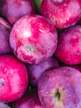 Close-up of many red juicy applesの写真素材