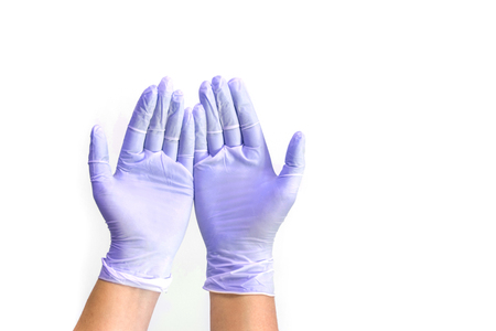 Doctor hand in sterile gloves Medical glove to protection and care for patients.の写真素材