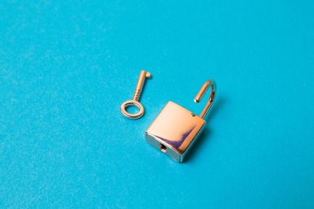 Internet data privacy information security concept. Opened padlock and keyの写真素材