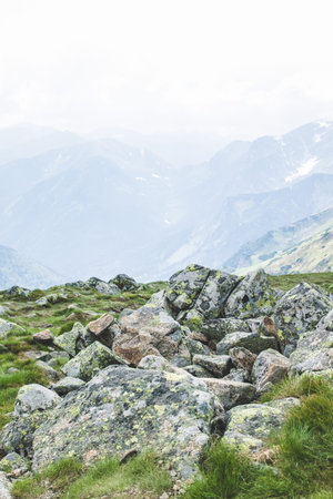 Close-up stones at the top of a mountain. Tourist Route To Kasprowy Wierch. Rocky trail high in the...