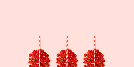 Summer health concept. Assorted ripe berries of strawberries, raspberries and currants in the form...