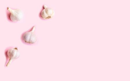 Flat lay composition with fresh garlic on light backgroundの写真素材