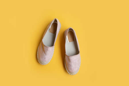 Various womens shoes on a colored background, top view. Top view, flat lay. Beauty blog concept.の写真素材