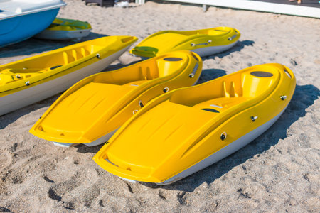 Two yellow kayaks on the beach of the island. Travel and vacation concept