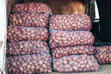 Fresh organic healthy potatoes vegetables at grocery storeの写真素材