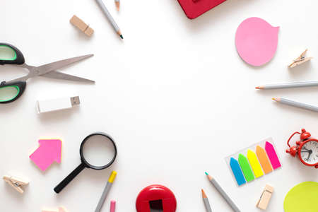 Back To School. Colorful school supplies for education study on a white background and copy space. Flat lay top viewの写真素材
