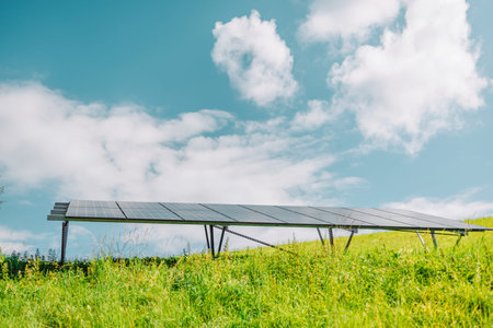 Solar panels and blue sky background.Solar cells farm on the roof. ESG